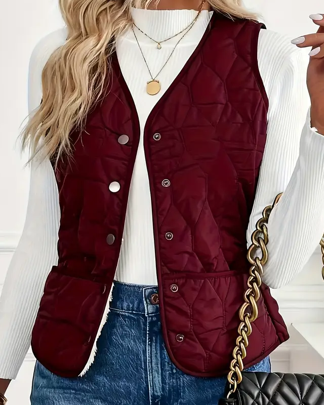 Lumina Wear Isabella quilted snap-front vest with sherpa lining, showcasing a stylish and cozy outerwear piece.