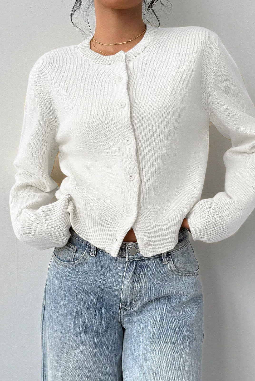 Relaxed cropped white cardigan sweater with ribbed trim from Lumina Wear, featuring a casual fit and soft knit fabric.