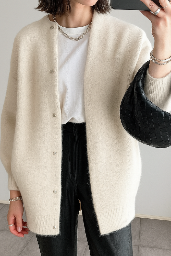 Light gray Lumina Wear Isabella relaxed fit long cardigan with patch pockets, draped over a model's shoulders.