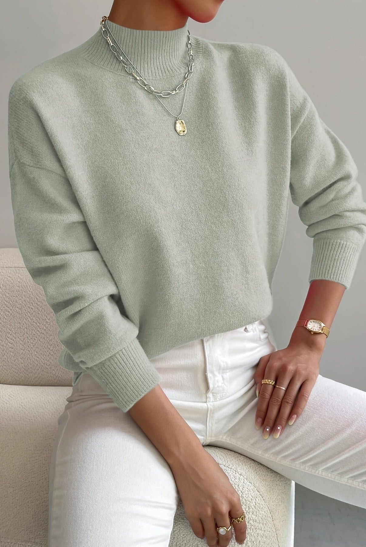 Lumina Wear Isabella relaxed fit soft knit sweater with mock turtleneck, featuring cozy fabric and casual style.