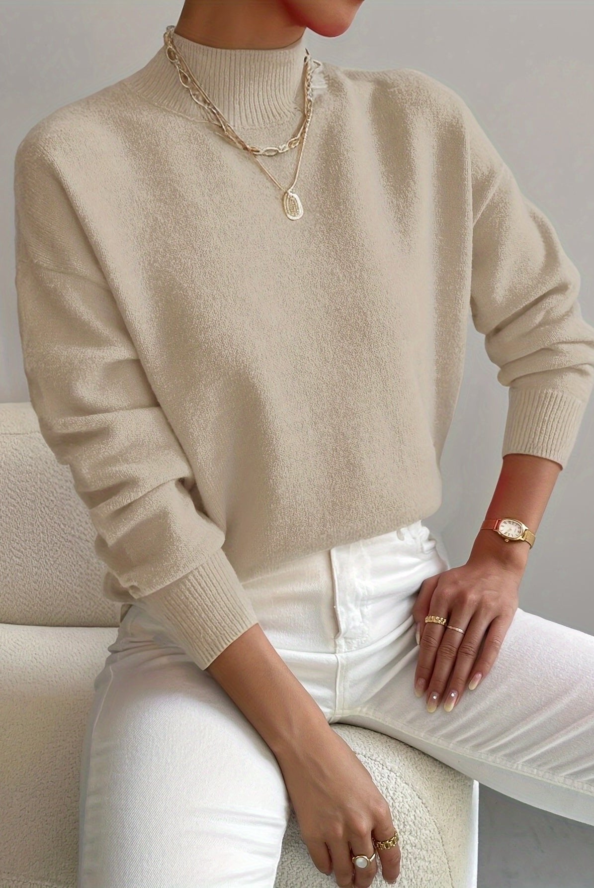 Lumina Wear Isabella relaxed fit soft knit sweater with mock turtleneck, shown in a cozy, casual fit on a model.
