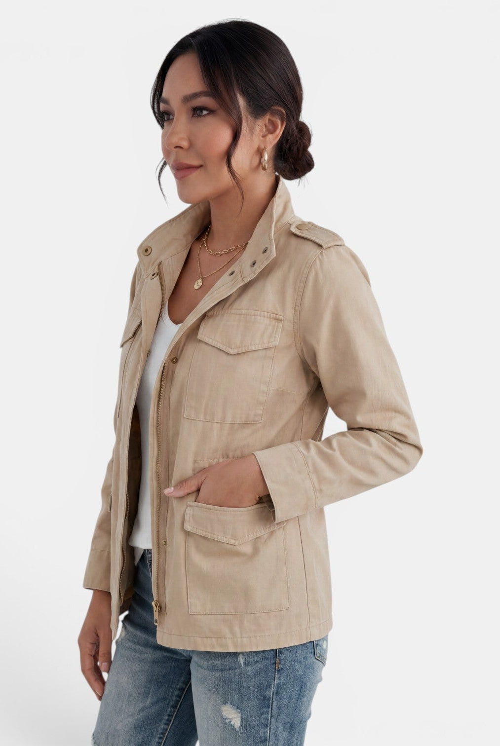 Light-colored Isabella Lumina Wear relaxed fit utility jacket with adjustable collar, shown on a model.
