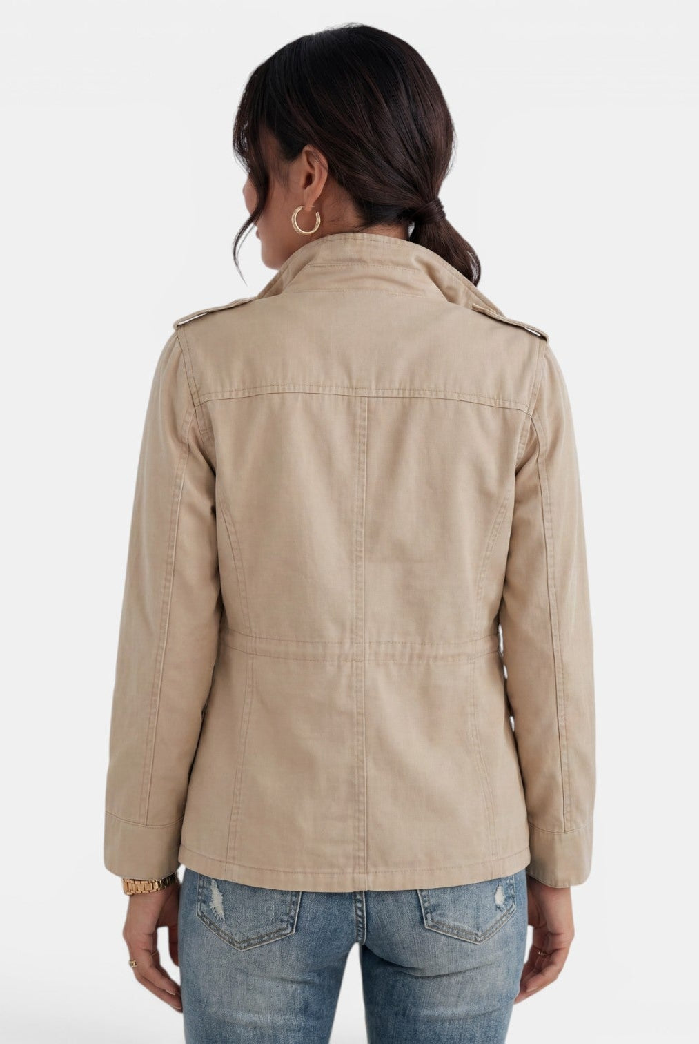 Lumina Wear Isabella relaxed fit utility jacket with adjustable collar, shown in a casual outdoor setting.