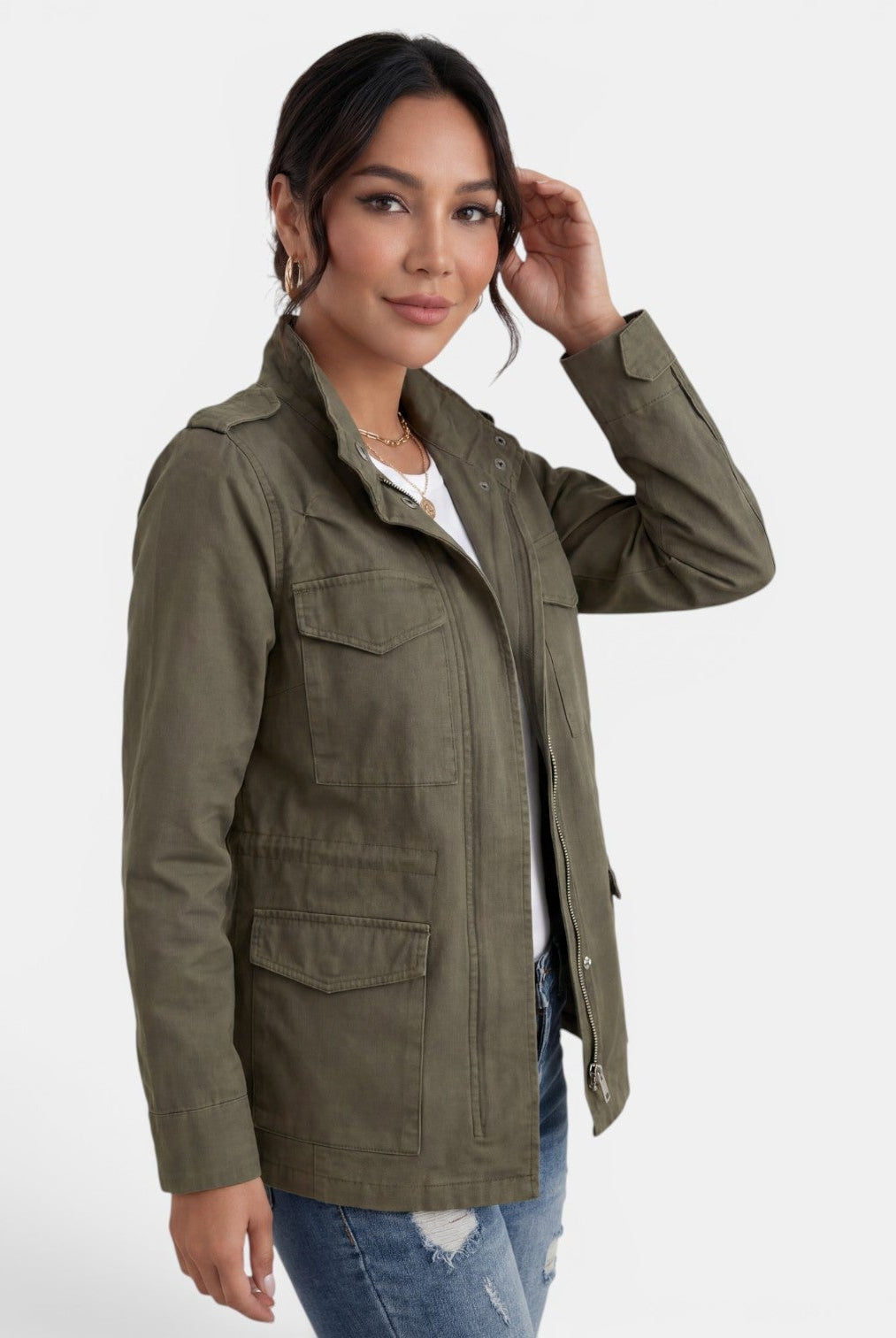 Lumina Wear Isabella relaxed fit utility jacket with adjustable collar, shown in a casual outdoor setting.