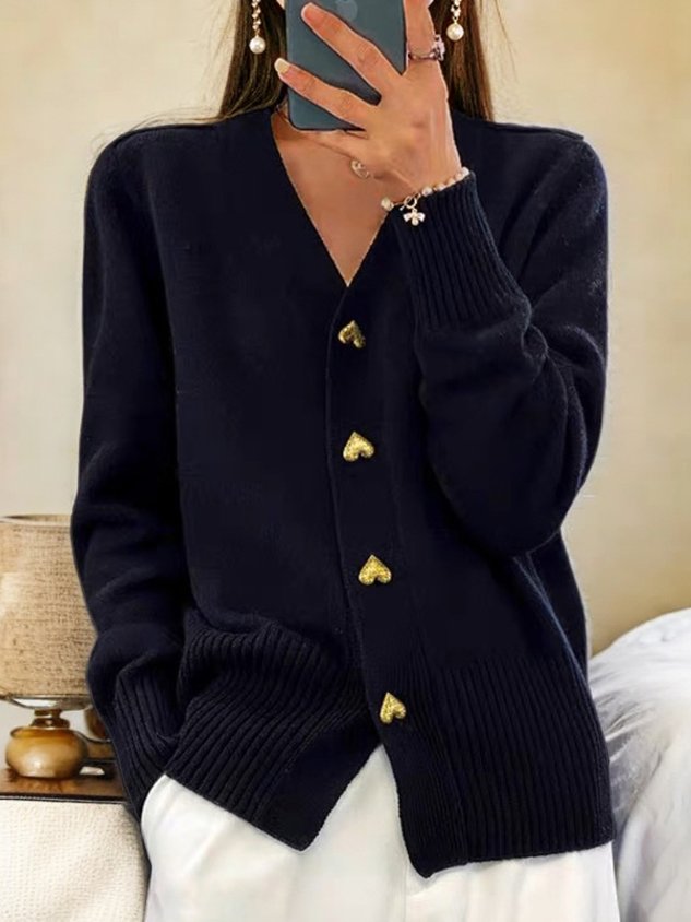 Longline white cardigan sweater for women by Lumina Wear with relaxed fit and heart-shaped buttons.