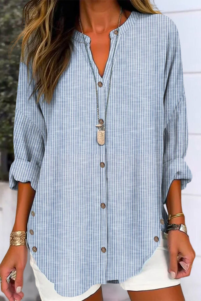 Isabella Lumina relaxed striped blouse with button front, casual fit, featuring blue and white horizontal stripes and long sleeves.