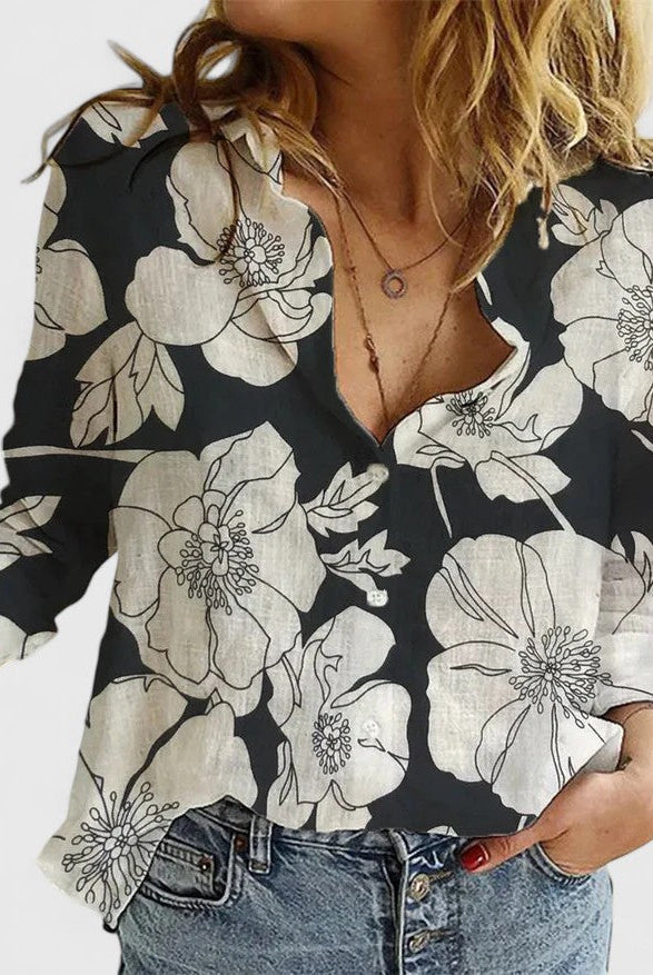 Light beige Lumina Wear Isabella relaxed V-neck blouse with button front, shown on a hanger. Soft fabric and casual style.