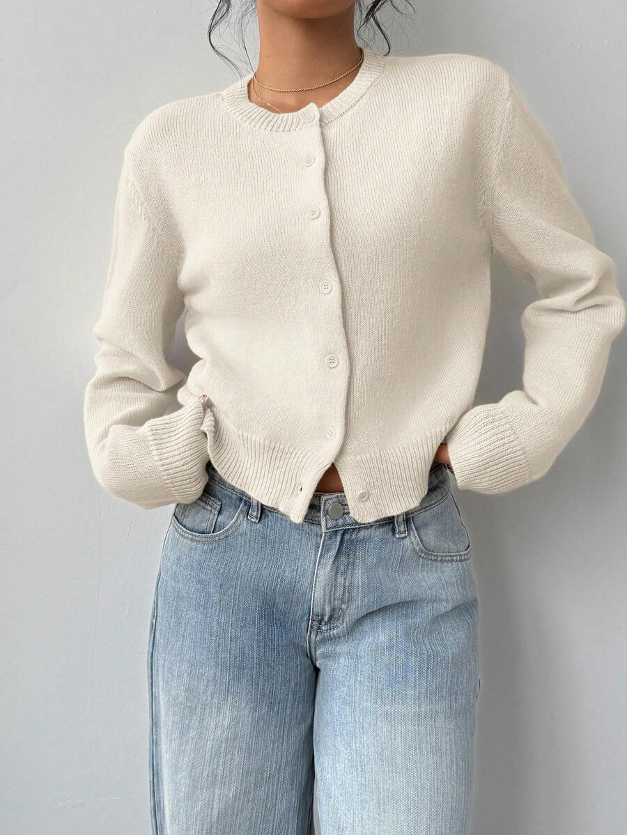 Lumina Wear Isabella soft knit women's cropped cardigan with relaxed fit and ribbed trim, styled on a model.