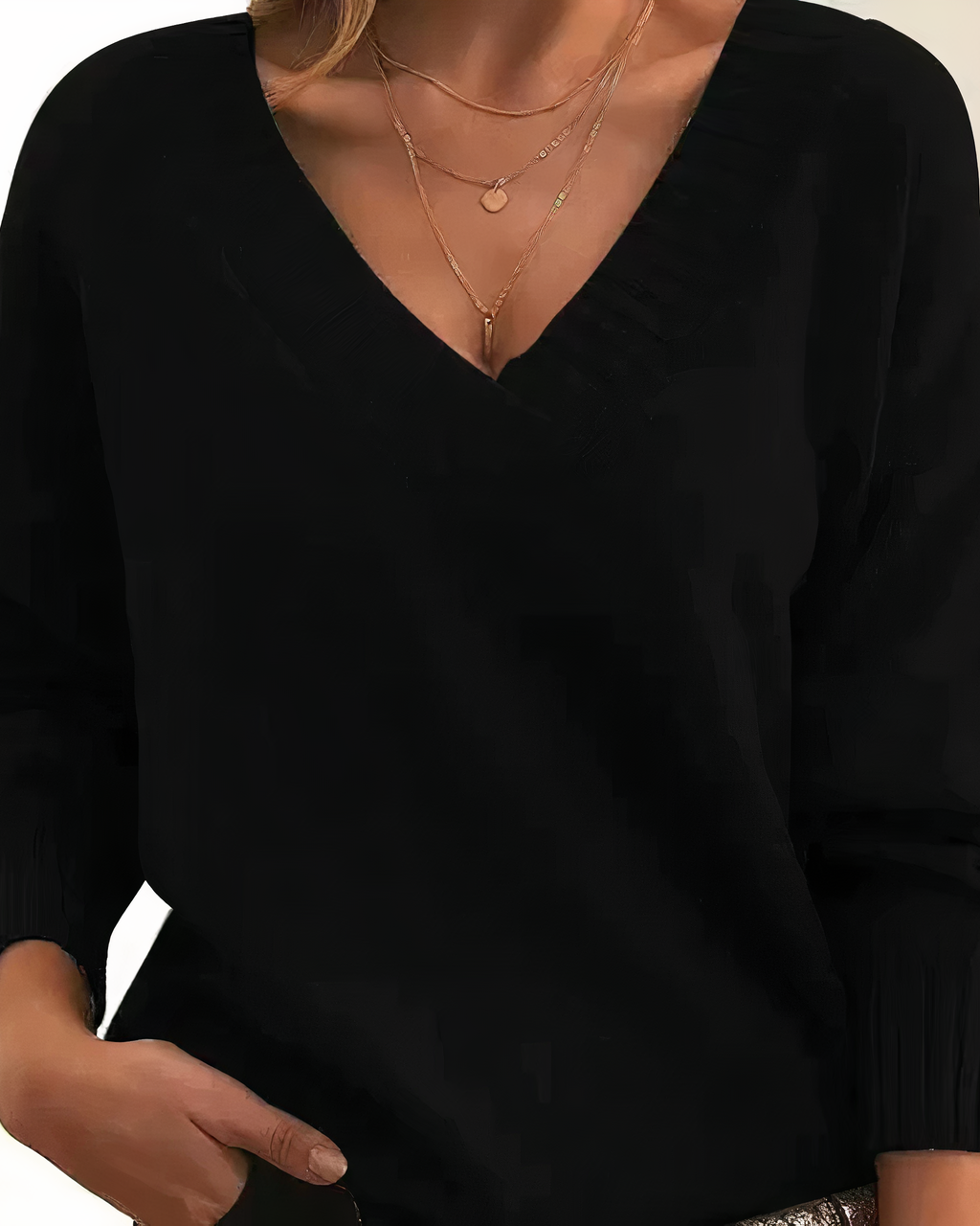 Lumina Wear Isabella lightweight V-neck sweater with relaxed fit and ribbed trims, made from soft, breathable fabric.
