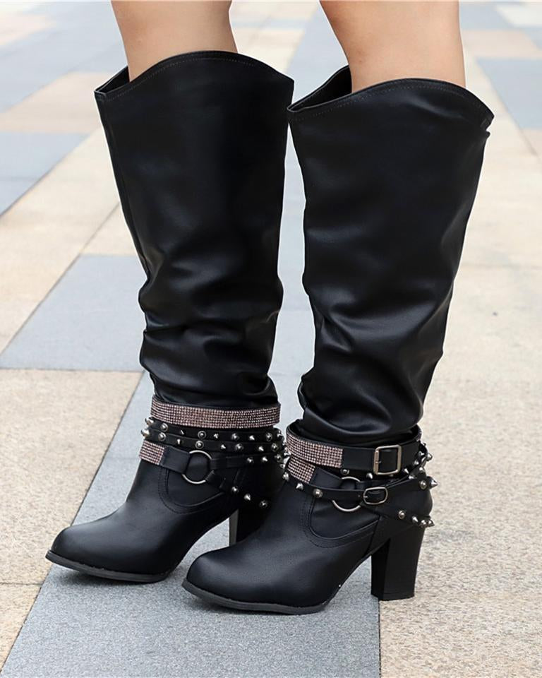 Lumina Wear Isabella knee-high boots with studded straps, slouch design, and block heel, showcasing stylish footwear.