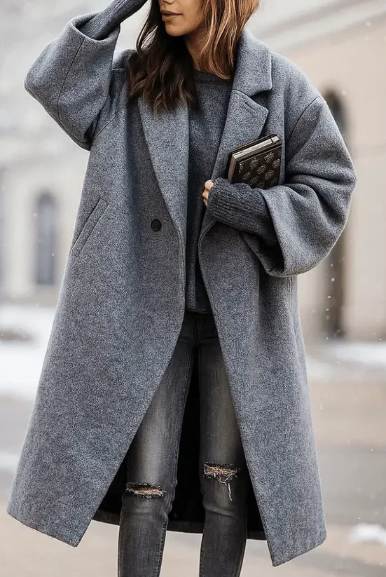 Lumina Wear Isabella women's long winter coat with a wide collar and sleek button front, ideal for stylish cold-weather wear.