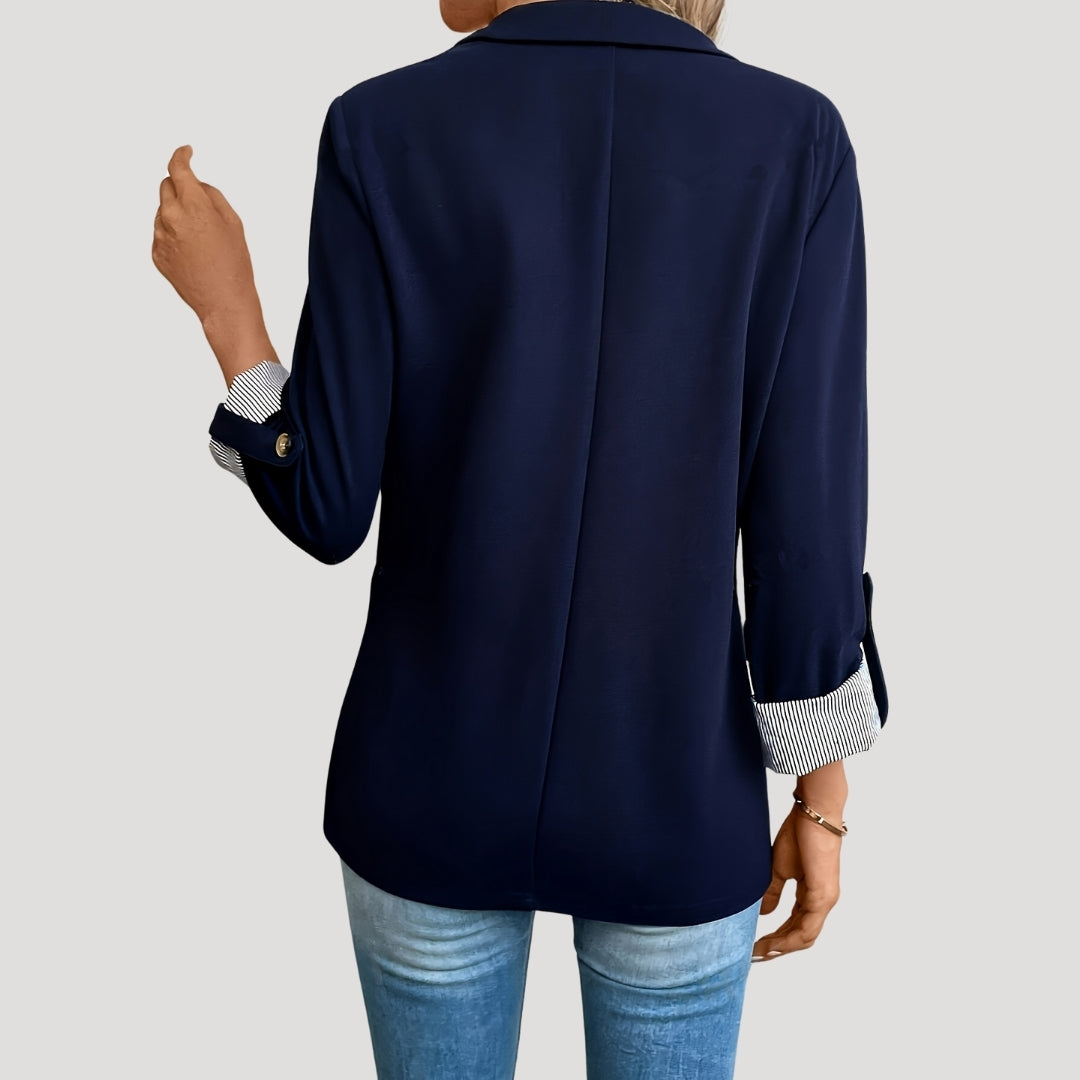 Lumina Wear Isabella women's tailored blazer with roll-up sleeves and flap pockets, shown in a stylish professional fit.