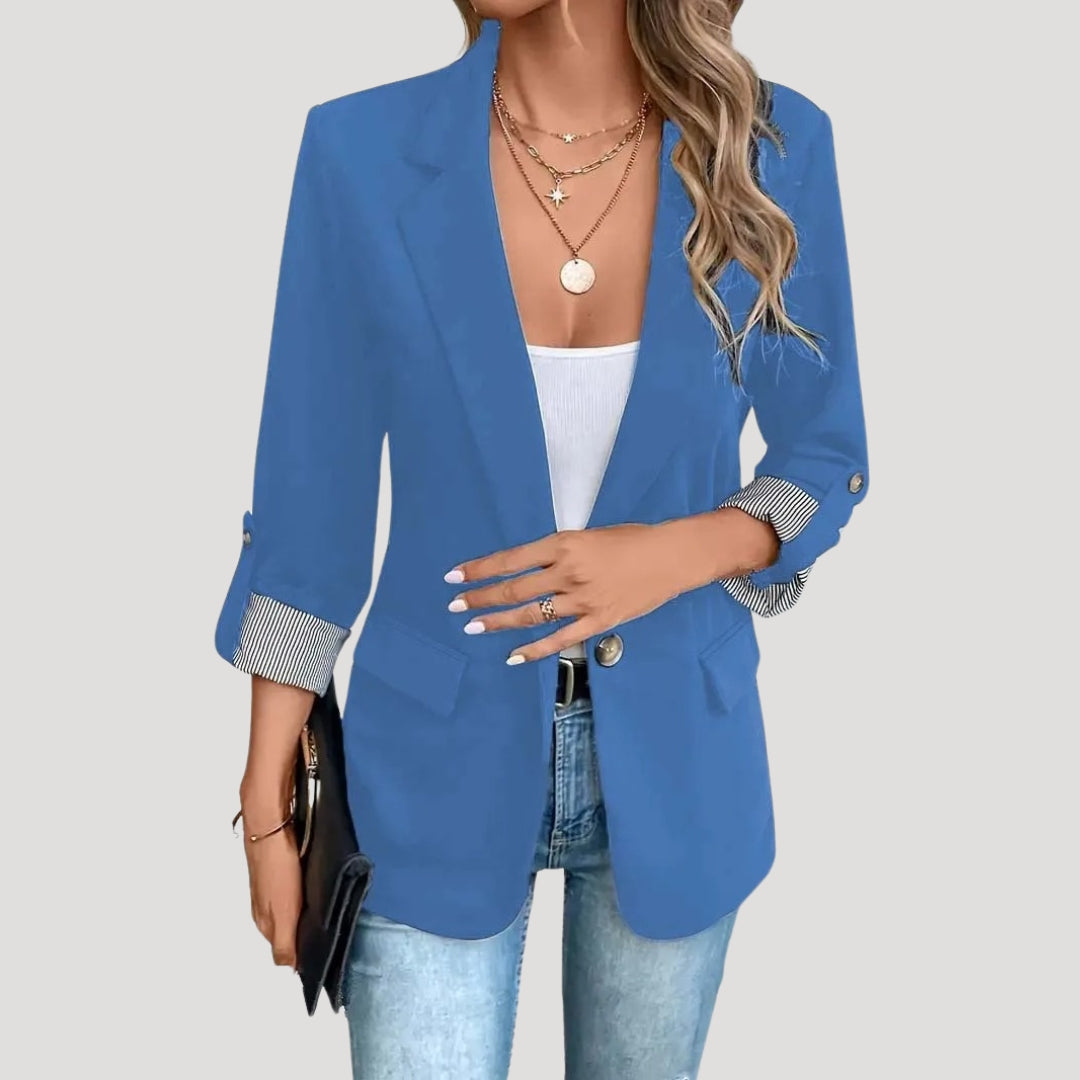 Women's Isabella tailored blazer by Lumina Wear featuring roll-up sleeves and flap pockets, shown on a model.
