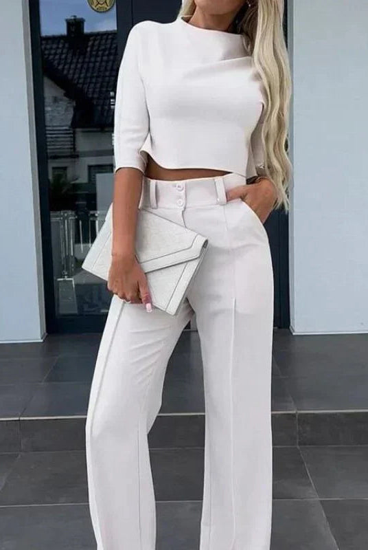 Isabella wearing the Lumina Wear Camille tailored crop top and high-rise wide-leg trousers set, stylish and modern outfit.