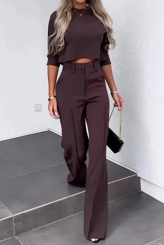 Isabella Lumina Wear tailored crop top and high-rise wide-leg trousers set, styled on a model, in a modern fashion look.