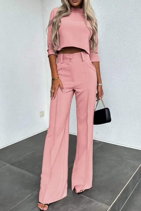 Isabella in Lumina Wear's Camille set featuring a tailored crop top and high-rise wide-leg trousers, stylish and modern.