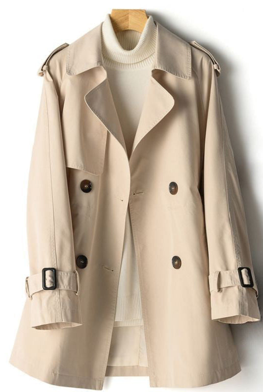 Lightweight tailored trench coat with waist cinch in beige from Lumina Wear, featuring classic design and stylish silhouette.