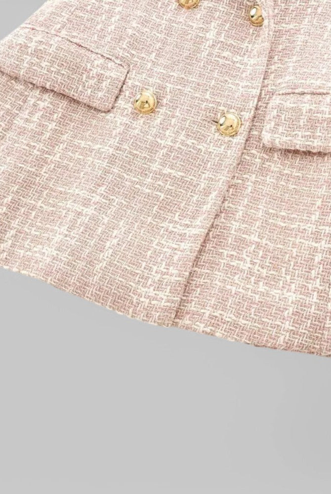 Pink tweed blazer by Lumina Wear featuring a tailored fit and double-breasted design, styled on a mannequin.