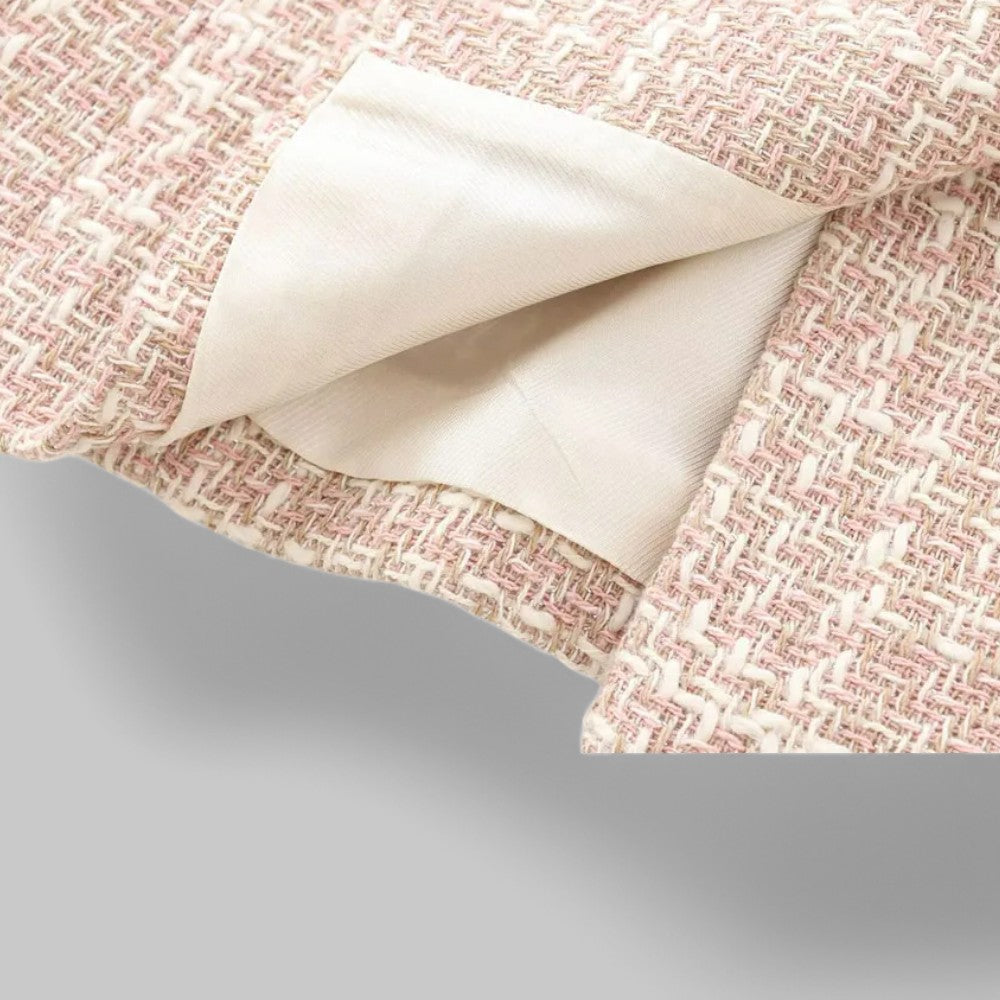 Pink tailored tweed blazer with double-breasted design for women, by Lumina Wear, shown on a model.