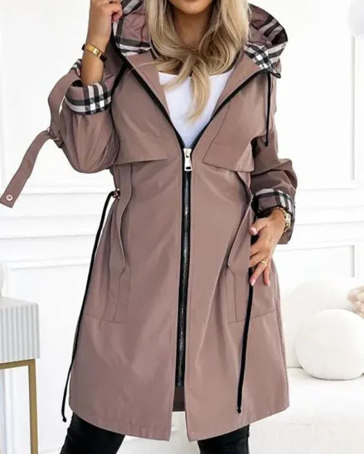 Lumina Wear Isabella waterproof parka with checked lining and drawstring waist, tailored coat for rain protection and style.