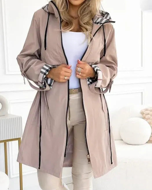 Lumina Wear Isabella waterproof parka coat with checked lining and drawstring waist, designed for stylish weather protection.
