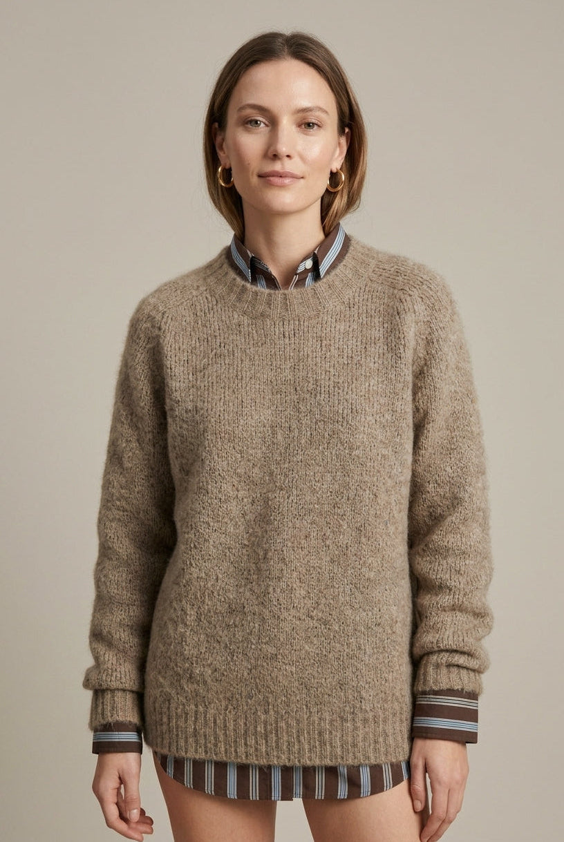 Lumina Wear Isabella textured ribbed oversized women's sweater with V-neck, soft knit fabric, and relaxed fit.
