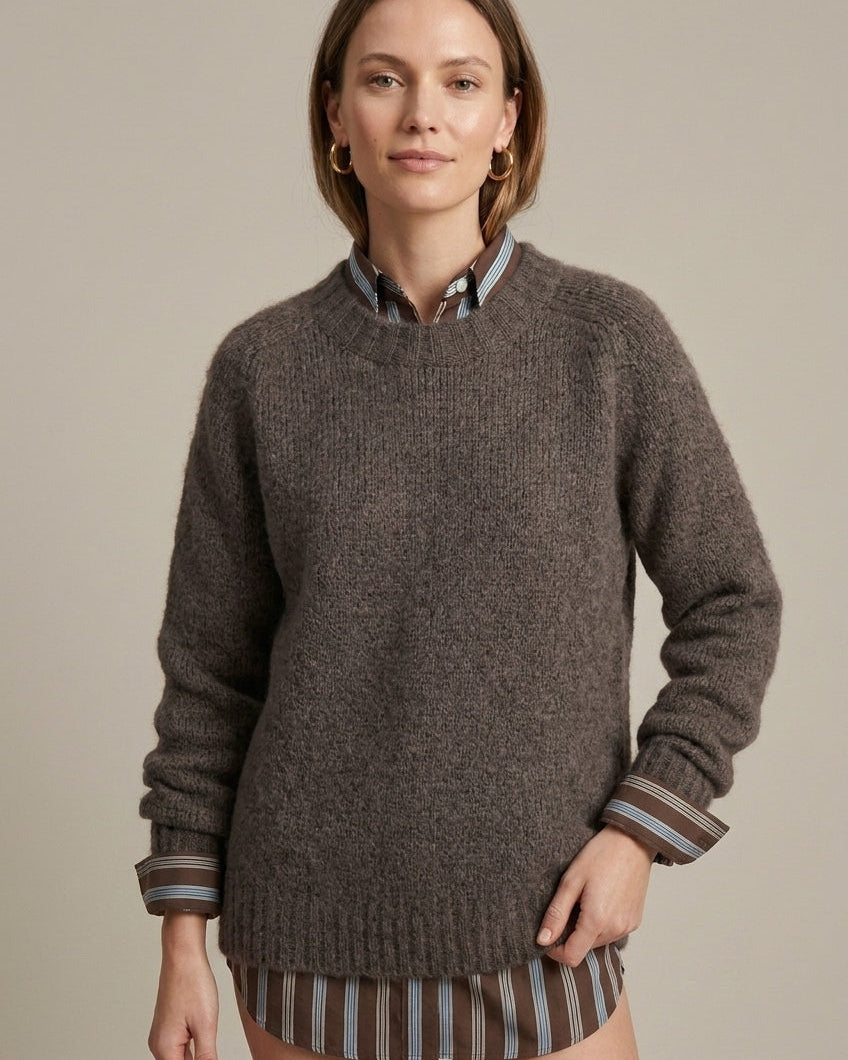 Textured ribbed oversized women's sweater with V-neck by Lumina Wear, shown in a cozy, neutral tone.