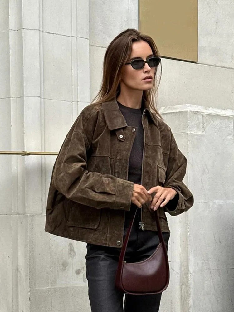 Lumina Wear Isabella women's textured utility jacket with snap-button closure and flap pockets, shown in a close-up view.