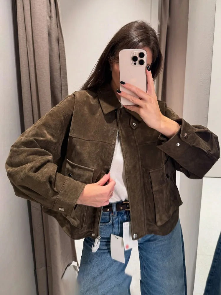 Lumina Wear Isabella women's textured utility jacket with snap-button closure and flap pockets, shown on a model.