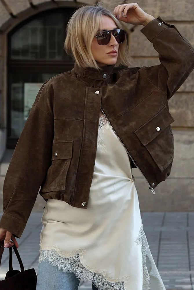 Delphine textured utility jacket by Lumina Wear featuring snap-button details and a turn-down collar.