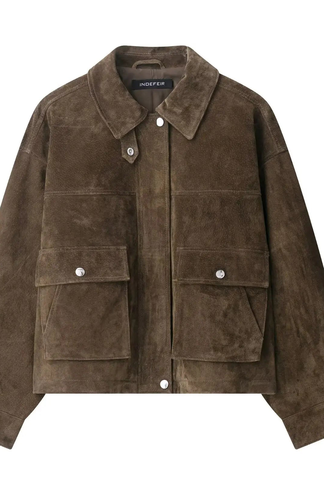 Delphine textured utility jacket by Lumina Wear featuring snap-button details and a turn-down collar, shown in image.