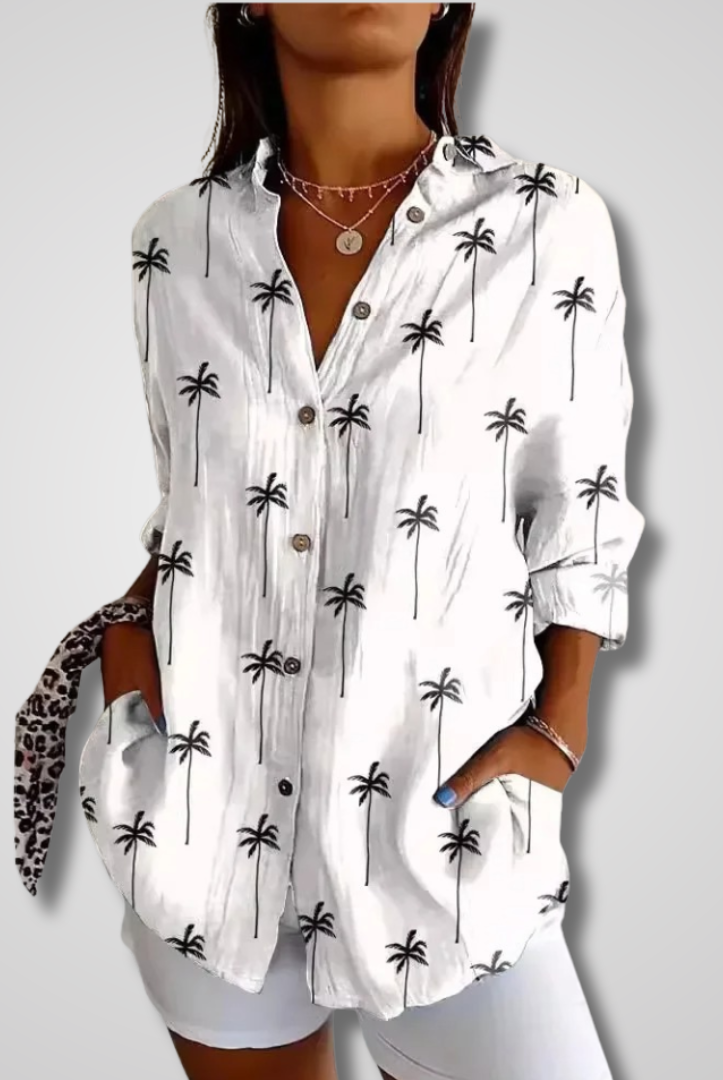 Light blue vintage-inspired Lumina Wear Isabella women's relaxed shirt with a soft, flowing fabric and effortless charm.