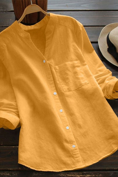 Light blue Jessica relaxed fit button blouse by Lumina Wear, featuring a timeless design and classic collar.