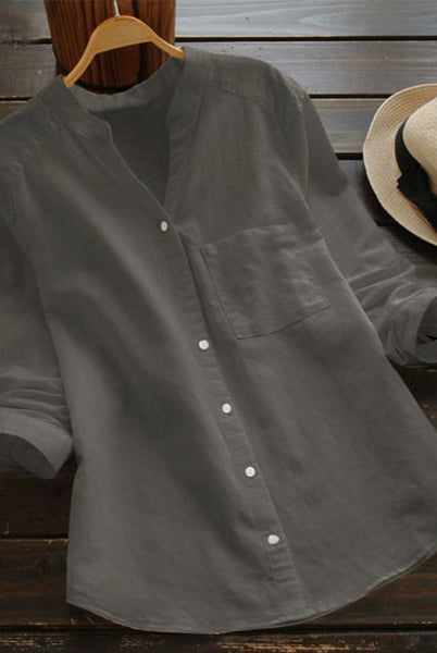 Pink Lumina Wear Jessica relaxed fit button blouse with timeless design, shown on a hanger against a neutral background.
