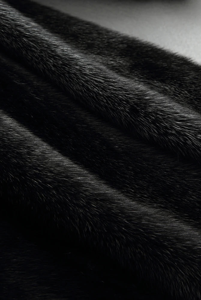 Lumina Wear Kensington elegant long faux fur winter coat with hood, stylish and warm winter outerwear for women.