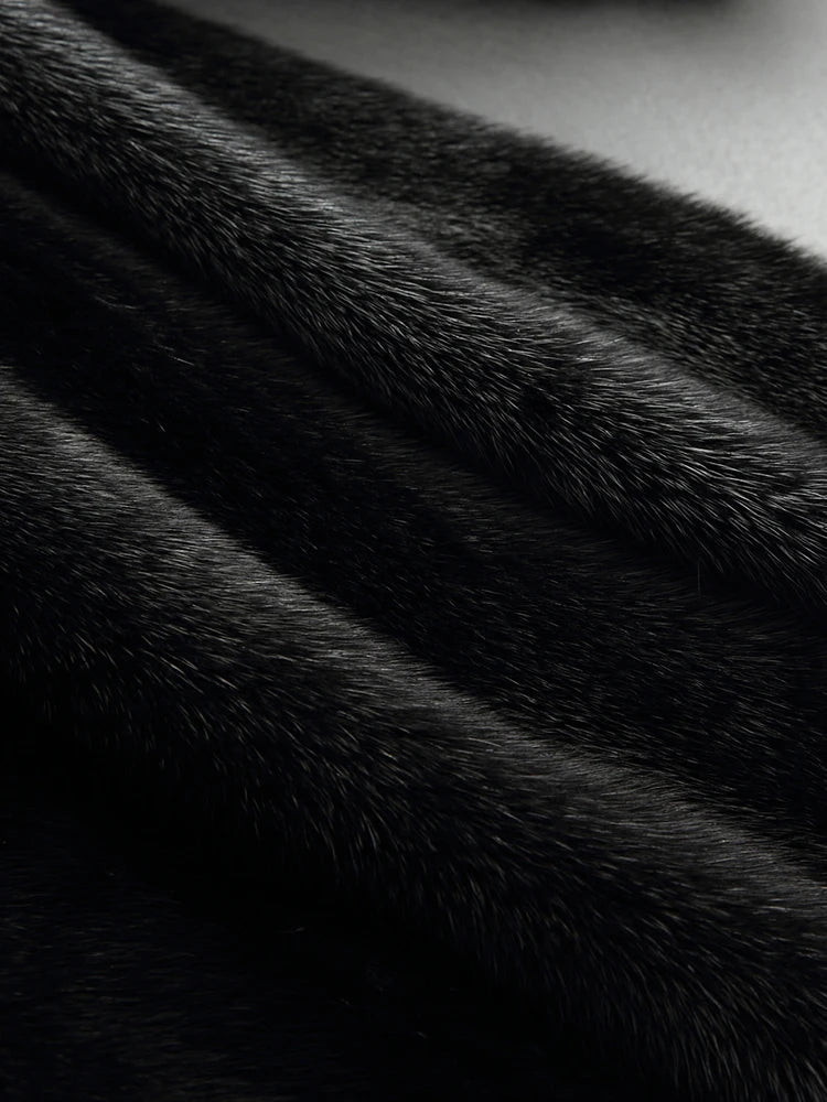 Lumina Wear Kensington elegant long faux fur winter coat with hood, stylish and warm winter outerwear for women.