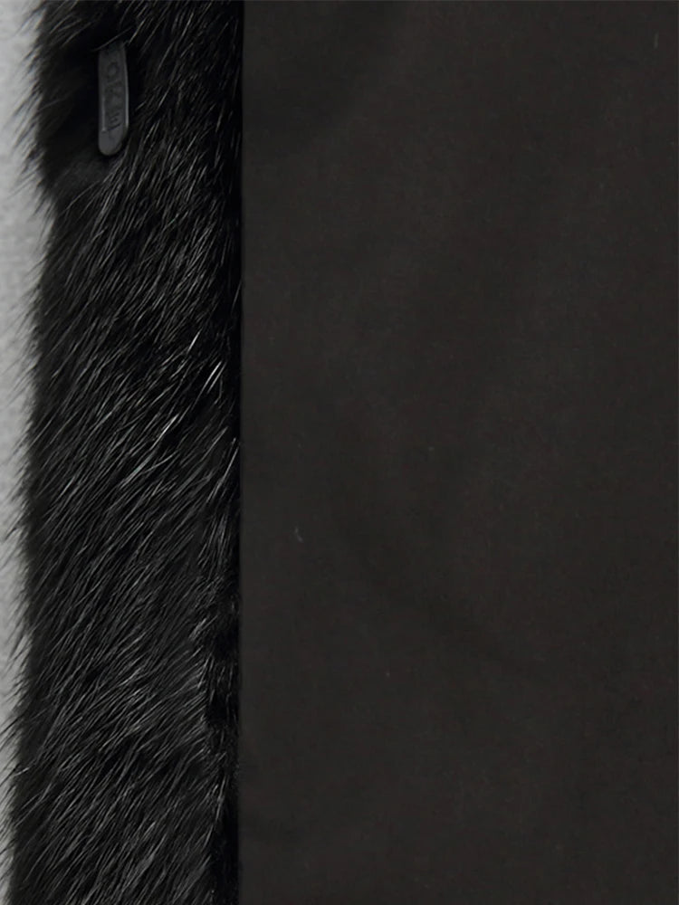 Luxurious Kensington Lumina long faux fur winter coat with hood, stylish and warm for cold weather.