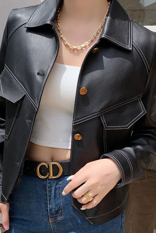 Lucille Lumina Wear cropped oversized faux leather jacket with button closure, featuring a stylish, modern design and textured finish.