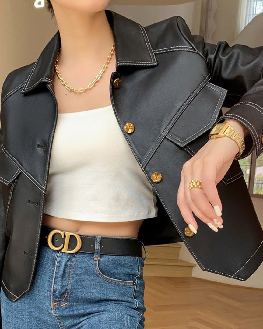 Lumina Wear Lucille cropped oversized faux leather jacket with button closure, featuring a stylish, edgy design.