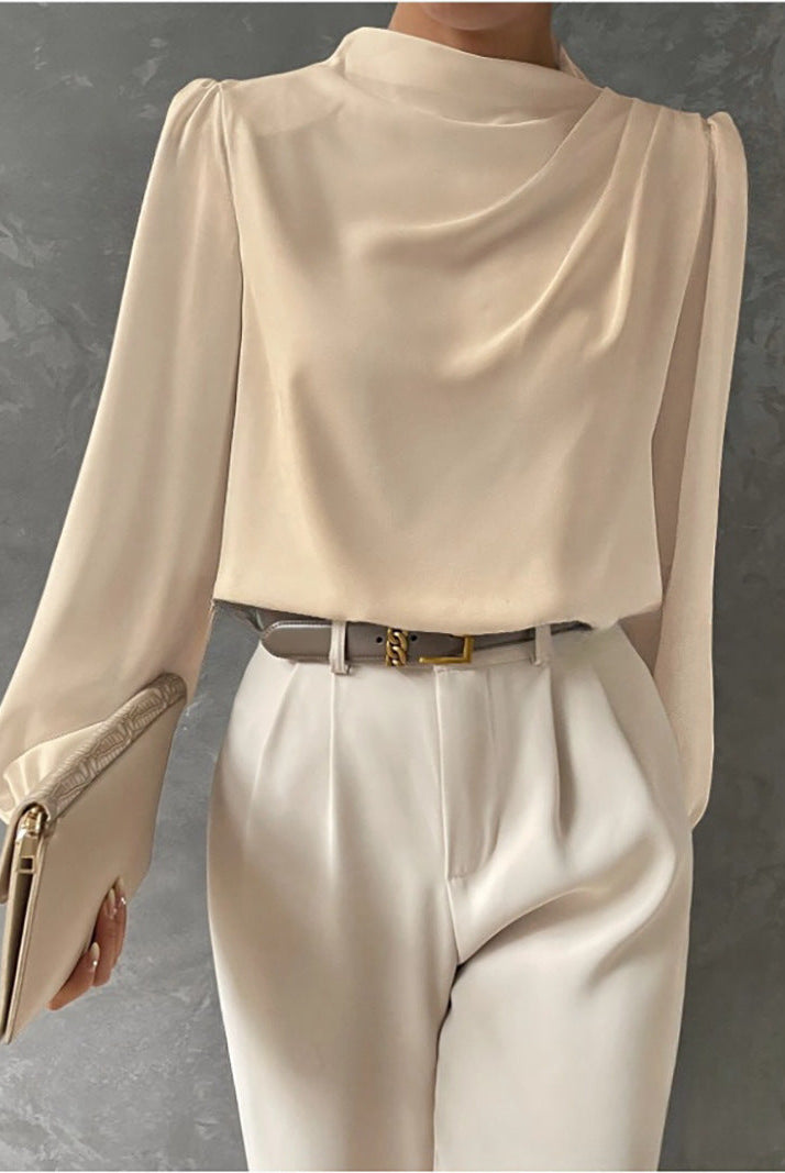 Lumina Wear Madison elegant relaxed fit blouse in soft fabric, showcasing a timeless style with subtle detailing.