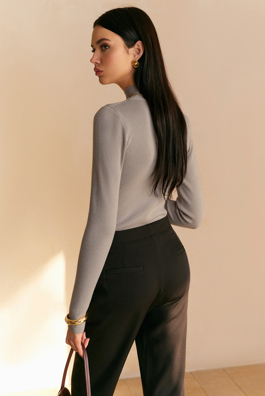 Lumina Wear women's top with elegant mock neck design and relaxed fit, showcasing soft fabric and stylish silhouette.