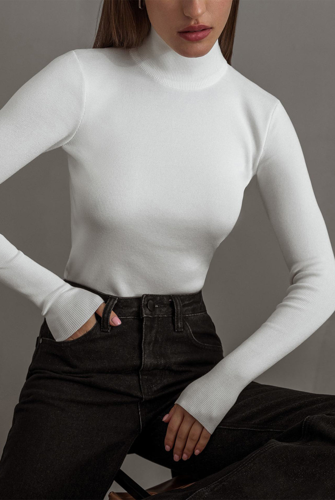 Women's Lumina Wear Maisie top with elegant mock neck, relaxed fit, soft fabric, and stylish design shown on a model.