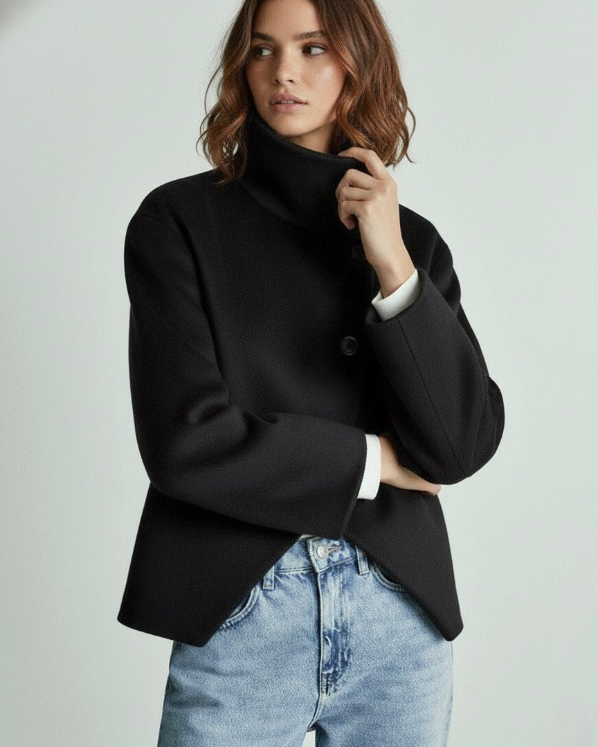 Structured high-neck cropped jacket by Lumina Wear featuring button closure and tailored design.