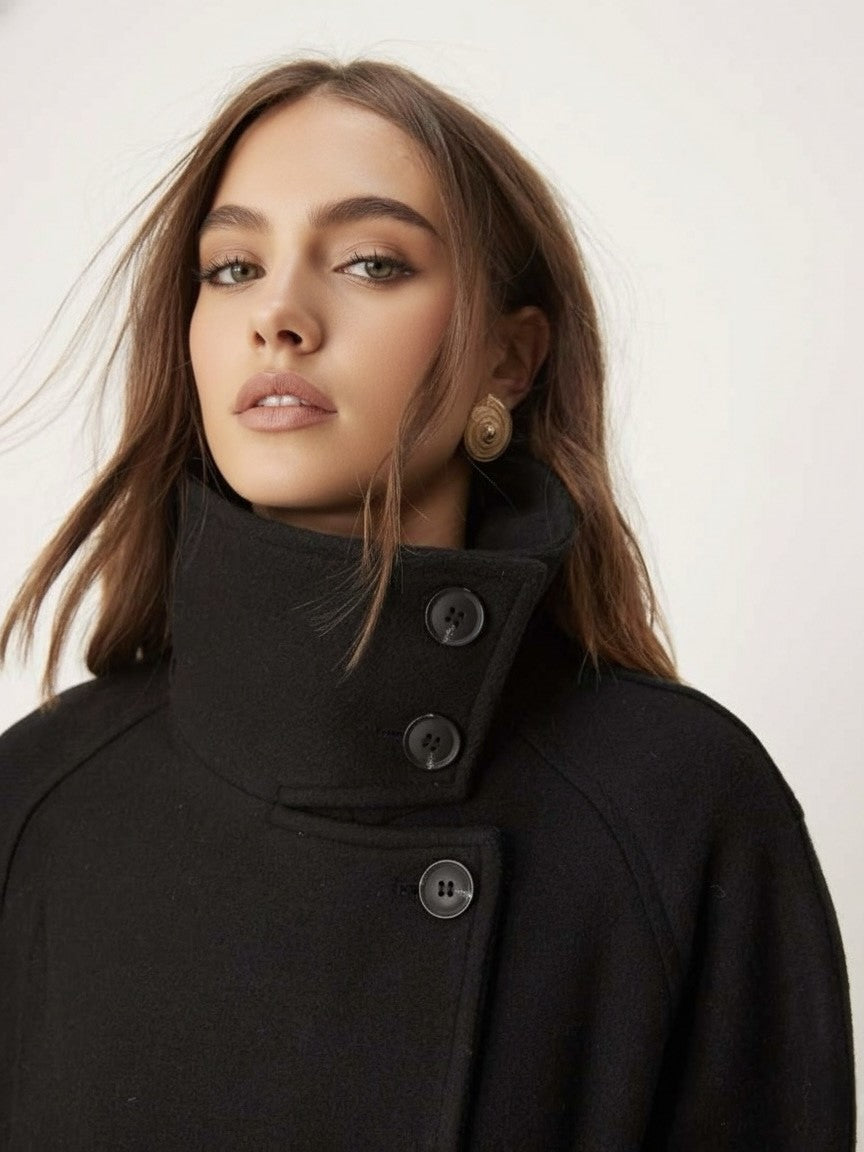 Lumina Wear Martha structured high-neck cropped jacket with button closure, tailored design and stylish fit.