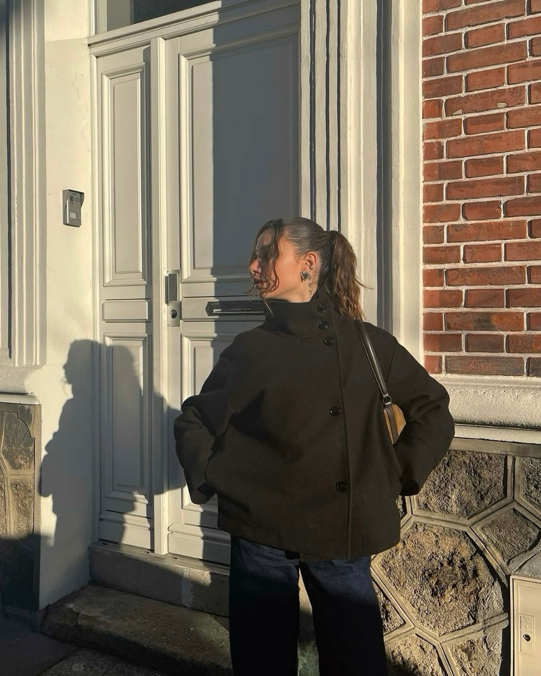 Lumina Wear Martha structured high-neck cropped jacket with button closure, stylish and fitted outerwear for modern fashion.