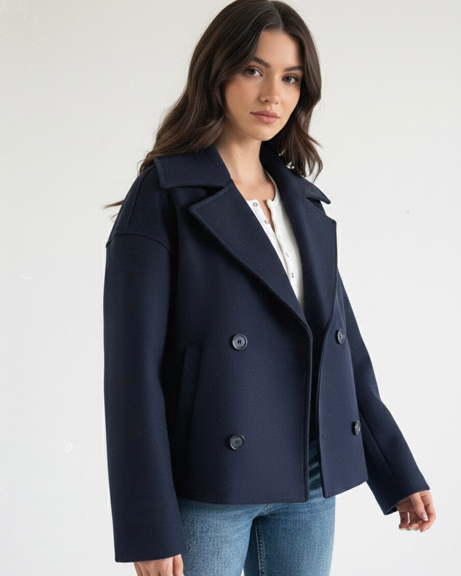 Lumina Wear Maya cropped double-breasted trench coat with structured shoulders, shown in a stylish, tailored design.