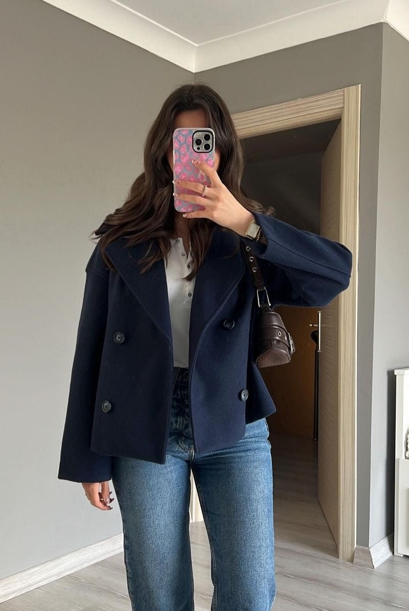 Lumina Wear Maya cropped double-breasted trench coat with structured shoulders, stylish and tailored for a modern look.