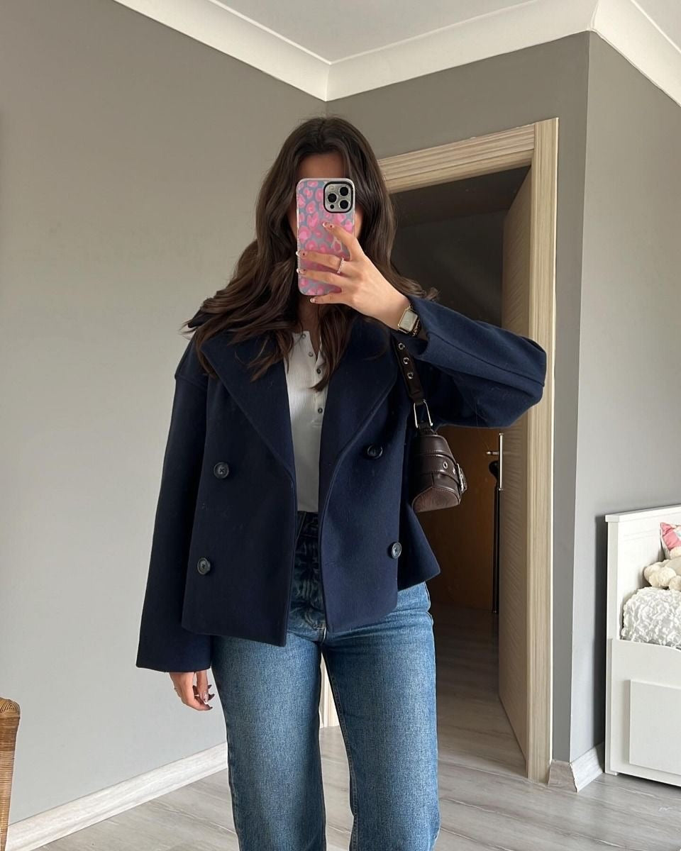 Lumina Wear Maya cropped double-breasted trench coat with structured shoulders, stylish and tailored for a modern look.