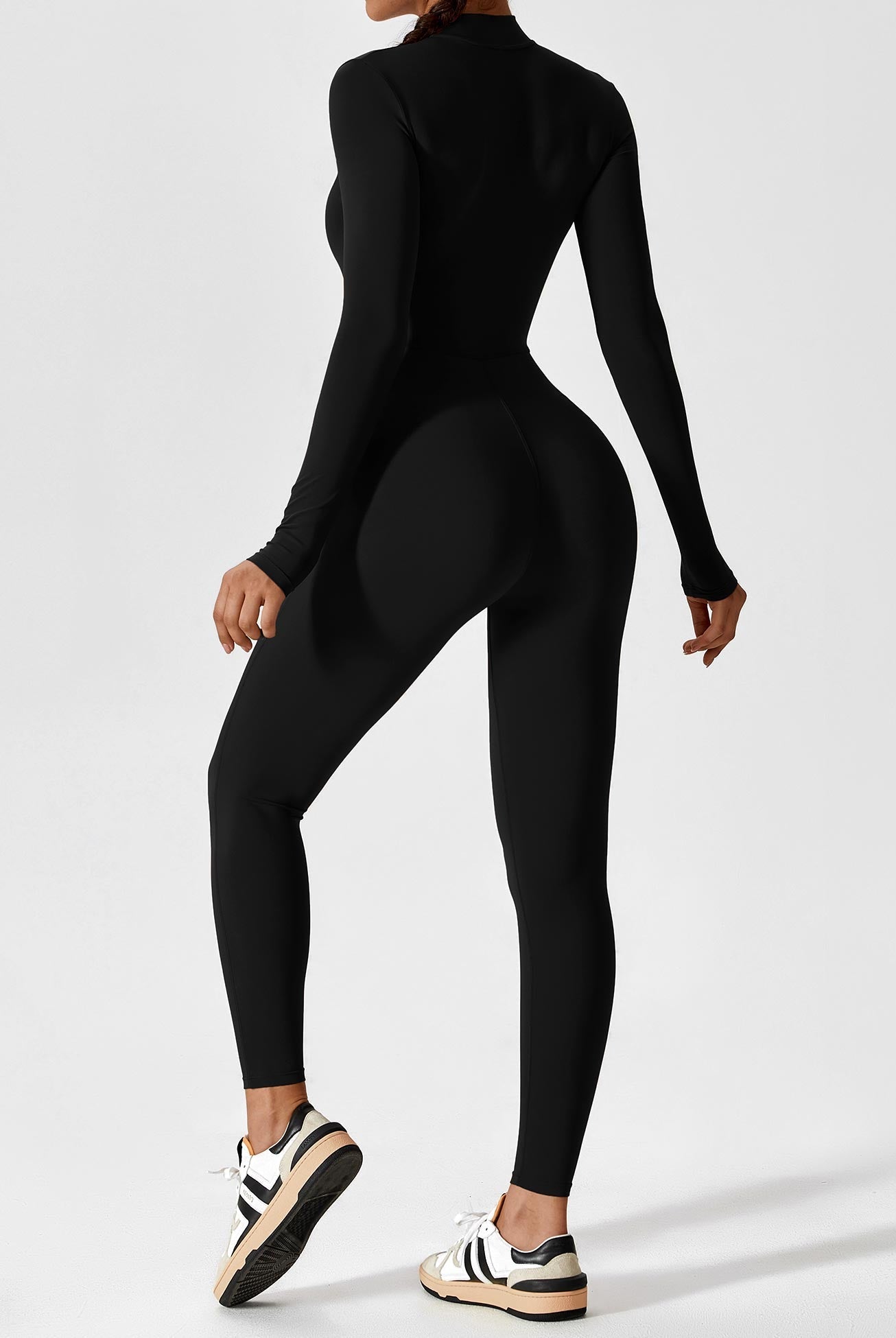 Lumina Wear Penelope sleek fitted two-piece dress set with zip detail, showcasing a modern, stylish look with a fitted silhouette.