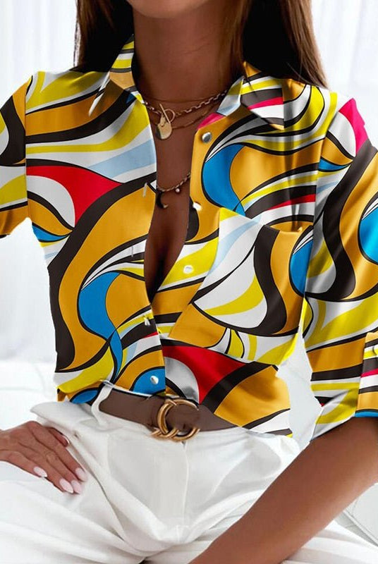 Peyton Lumina Wear bold patterned relaxed fit blouse for women, featuring vibrant designs and comfortable fabric.